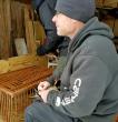DEC Wildlife Biologist Frank Morlock showing prep handling of a mallard duck for blood draw