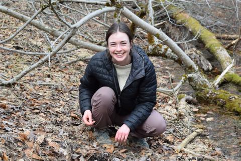 Mariel searching for salamanders in the the field