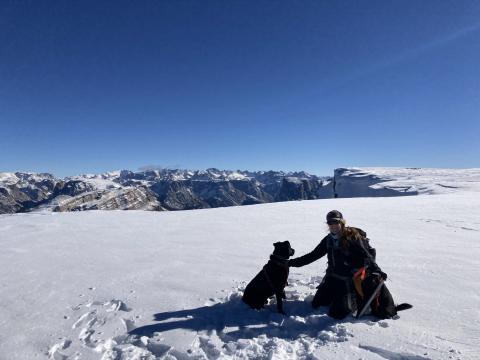 Free time includes hiking, biking, or skiing in the mountains with her dogs.