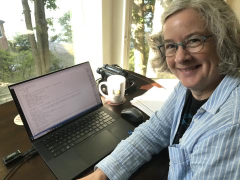 Rachel at her computer