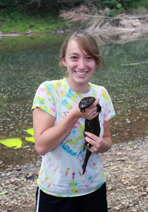 Alyssa holding an Eastern hellbender